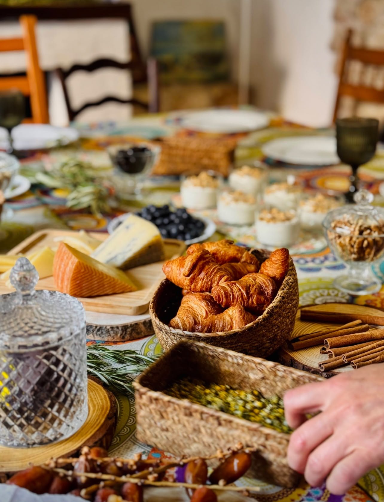 The long breakfast table laid out in the morning sun